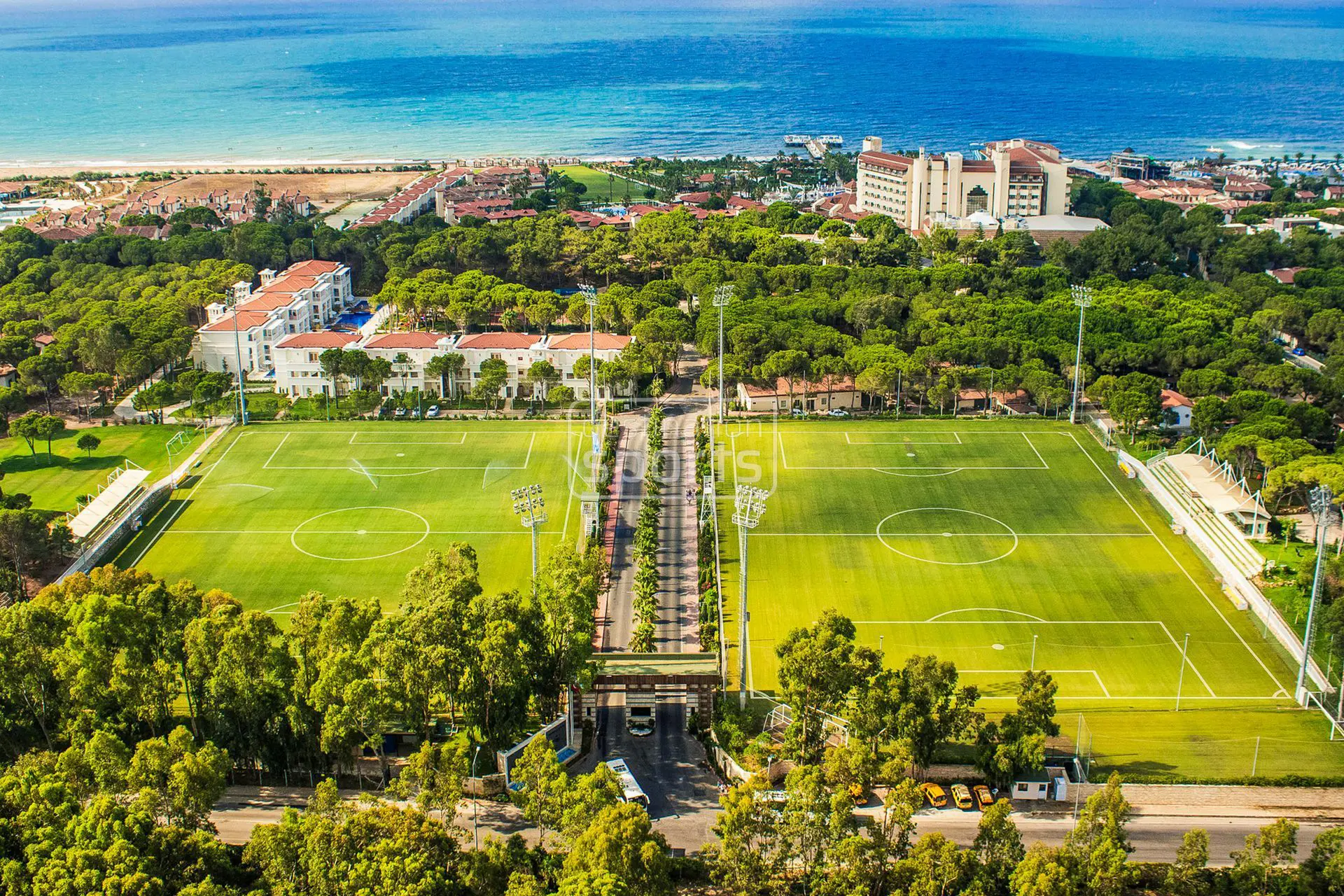 Soccer field at Bellis Deluxe Hotel, Turkey, with natural grass, near the sea