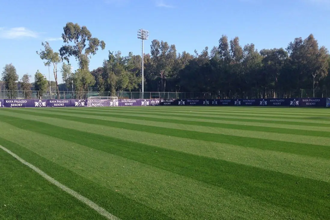 Soccer field at Kaya Belek Hotel, Turkey, with natural grass, near the sea
