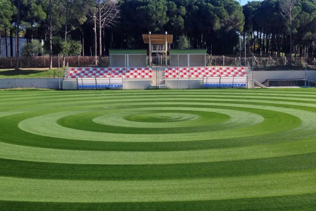 Soccer field at Kaya Belek Hotel, Turkey, with natural grass, near the sea