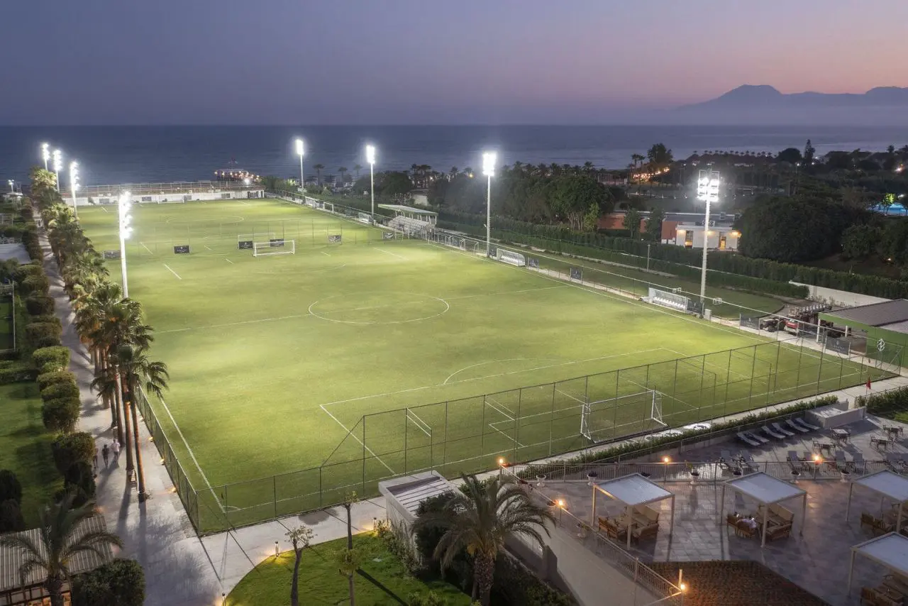 Soccer field at Nirvana Cosmopolitan Hotel, Turkey, with natural grass, near the sea
